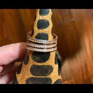 Rose gold tone fashion ring.